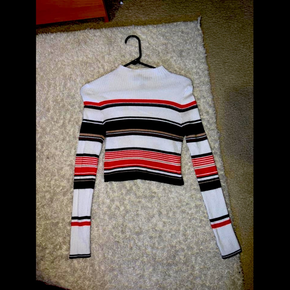 Turtle neck stretchy material. Size Large